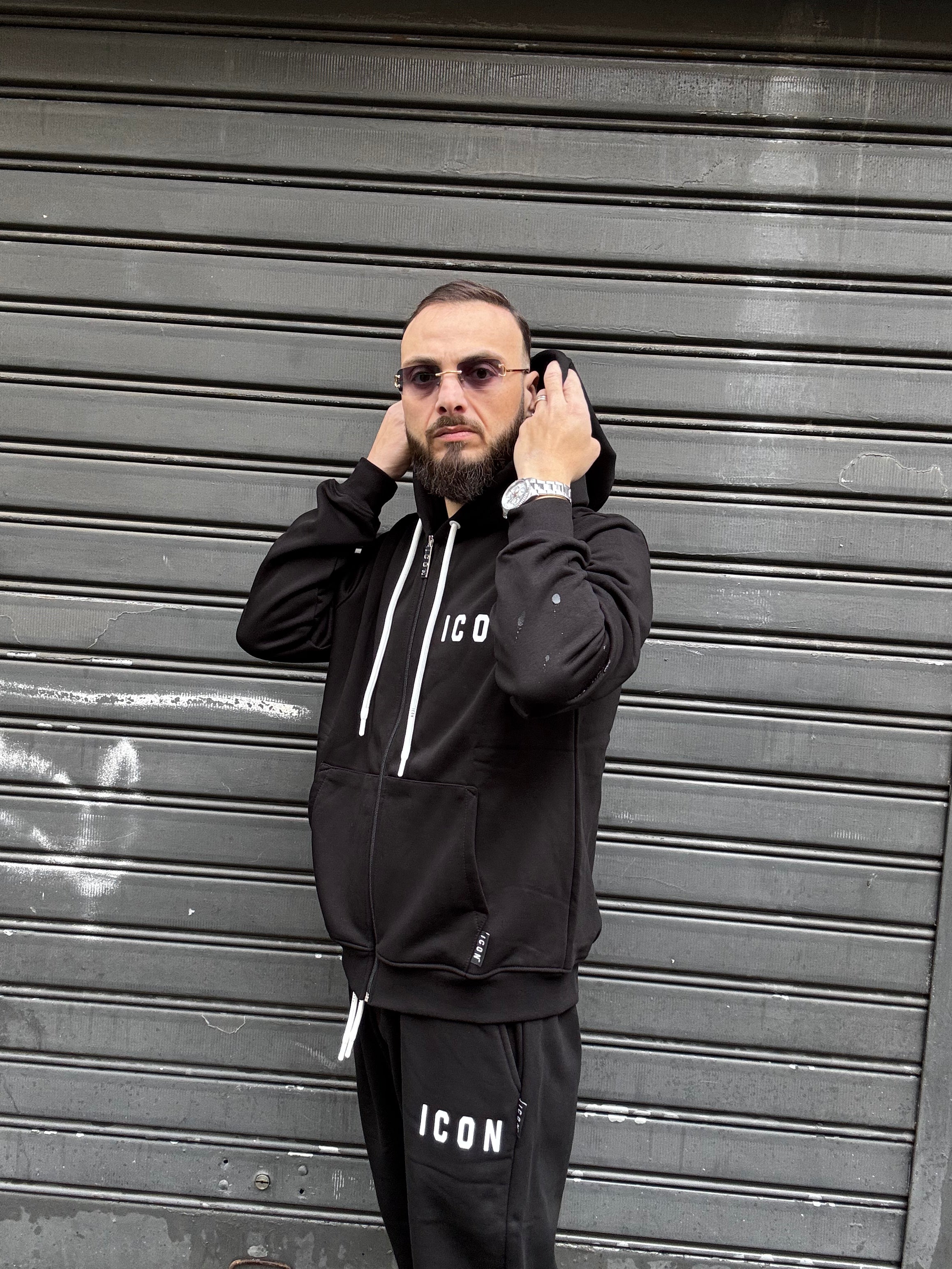 tuta icon con cappuccio e zip