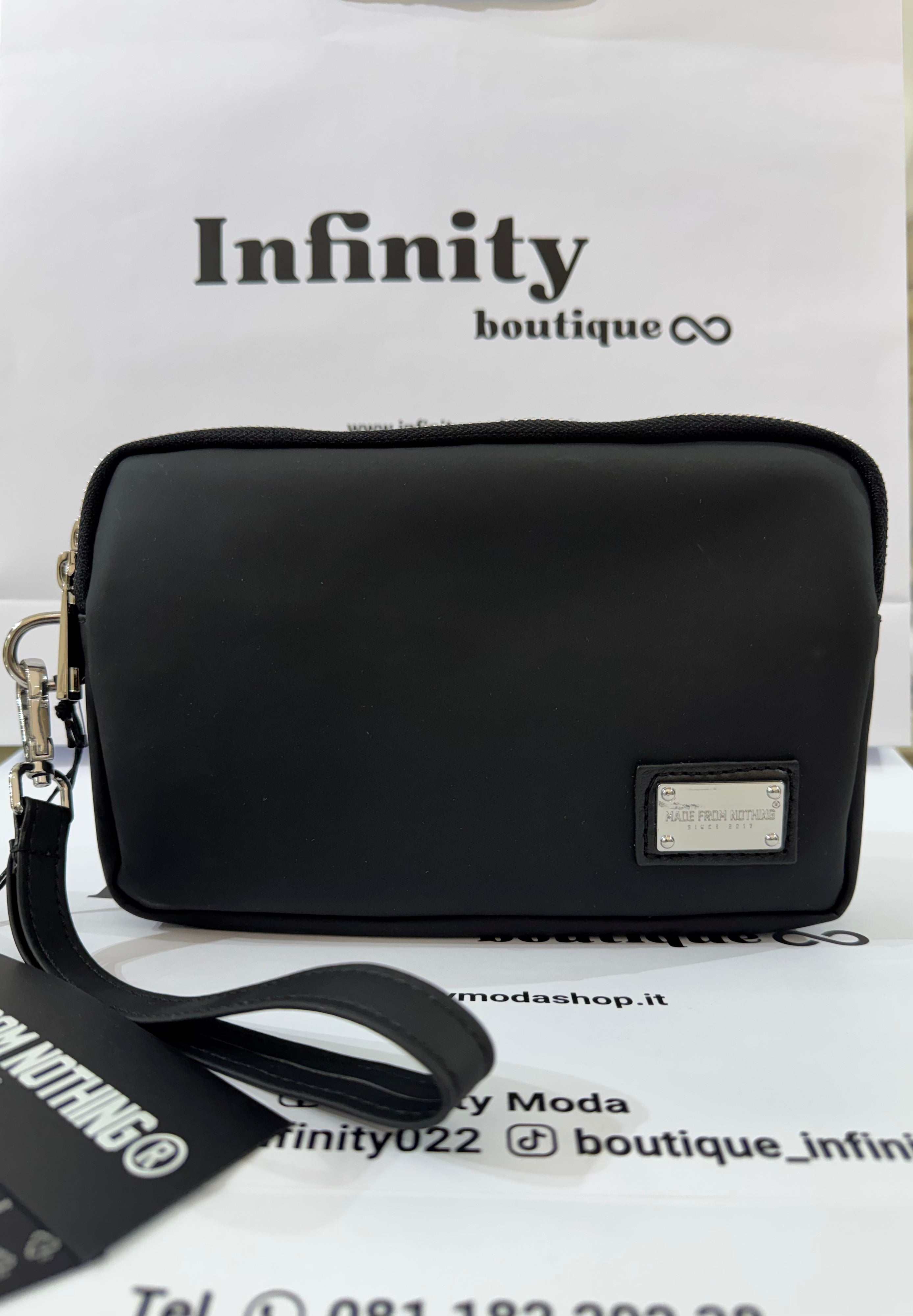 Pochette in ecopelle MFN, elegante e versatile.